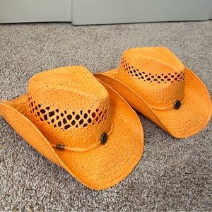Two Orange Straw Cowgirl Hats